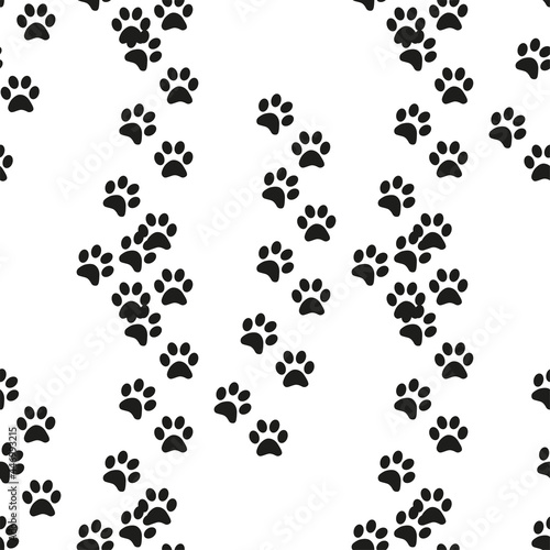 Fototapeta Naklejka Na Ścianę i Meble -  Animal footprint seamless pattern. Footprints of a cat