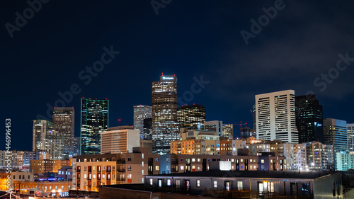 amazing landscape shot of downtown denver at night from a rooftop © Aon Prestige Media