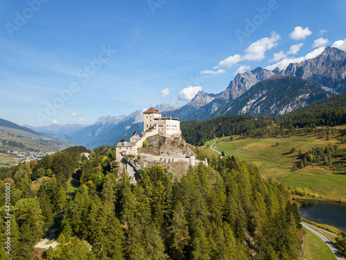 Aerial view of Castle Tarasp (built in the 11th century) in Swiss Alps, Canton Grisons or Graubuendon, Switzerland
