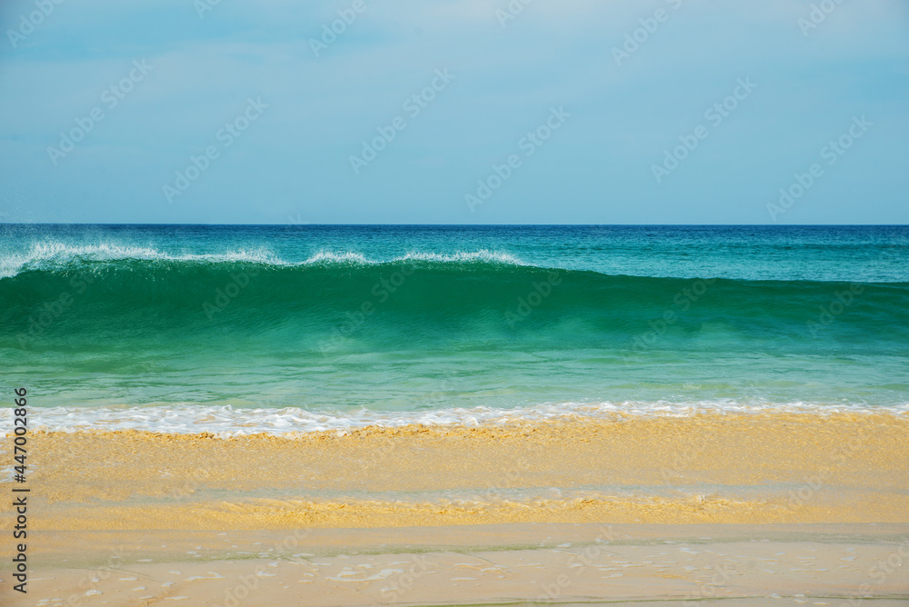 Beautiful tropical landscape sea view with splashed waves. Sea and ocean energy. Relaxation and nature. Space for text