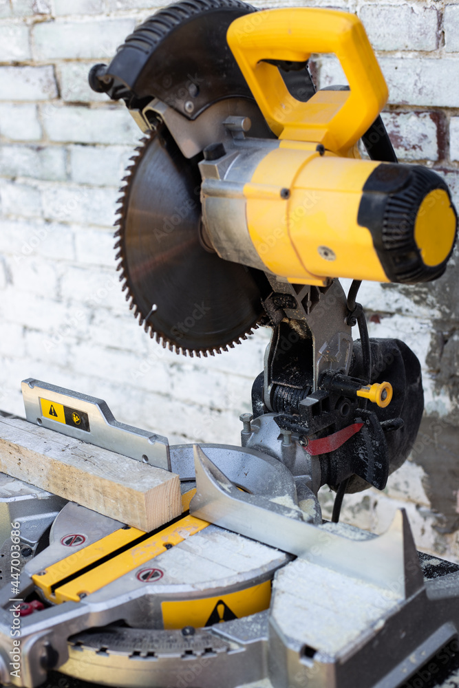 Circular saw with a sharp saw. Making furniture with a professional tool Circular saw with a sharp saw. Making furniture with a professional tool