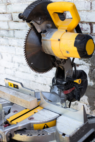 Circular saw with a sharp saw. Making furniture with a professional tool