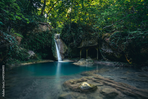 waterfall in the forest © GOKHAN