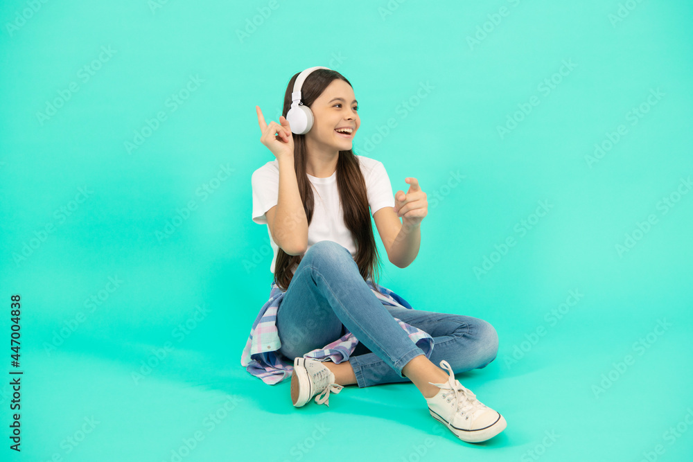 lets sing. child in modern earphones. online education. back to school. happy teen girl in headphones