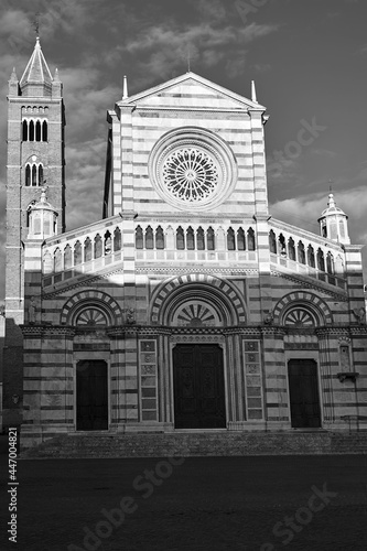 Facade of the historic cathedral with belfry in the city of Grosseto