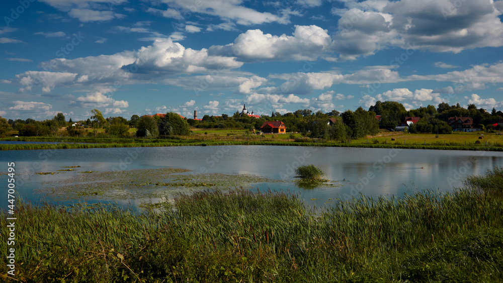 Lake on the background of a rural landscape Lake on the background of a rural landscape