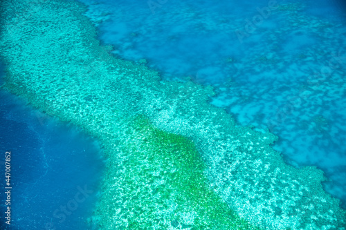 Aerial view of Whitsunday Islands Coral Reef of Queensland from the aircraft.