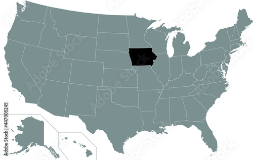 Black highlighted location map of the US Federal State of Iowa inside gray map of the United States of America