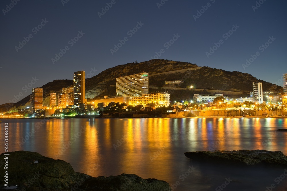 Night view of Alicante, Albufereta beach. Spain.