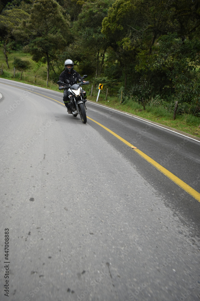 man riding a vehicle on the road man riding a vehicle on the road