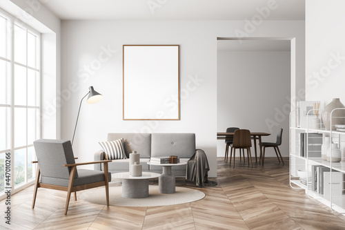 Mock up empty posters on the wall. Modern living room interior. Wooden floor and stylish furniture. Concept of contemporary design. photo