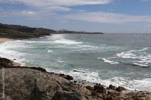 Image of the beach with waves and rocks of the castros de Baroña. Porto do Son. Galicia. Spain.