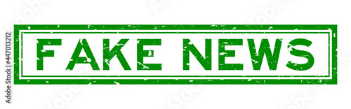 Grunge green fake news word rubber business seal stamp on white background