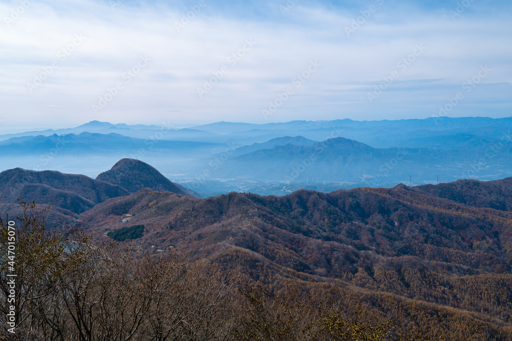 紅葉の季節の群馬県の赤城山の登山道の風景 A view of the trail at Mount Akagi in Gunma Prefecture during the season of autumn leaves. 紅葉の季節の群馬県の赤城山の登山道の風景 A view of the trail at Mount Akagi in Gunma Prefecture during the season of autumn leaves.