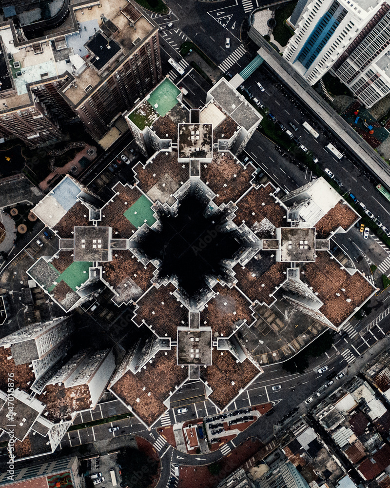 eagle eye capture of large symmetrical building in a historic town in asia