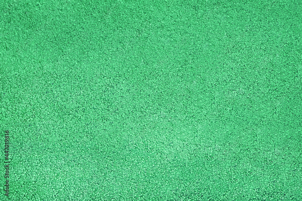 Fototapeta premium Surface of rubber pellets in treadmill athletics field texture background