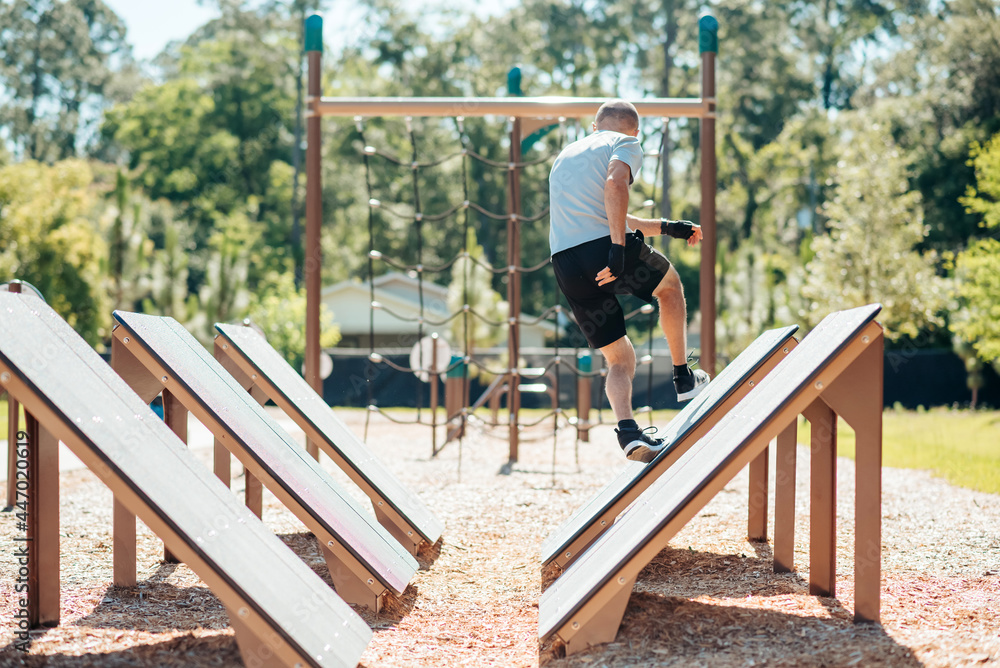 Quintuple Steps jumps, cross fit and ninja training course outside. Quintuple Steps jumps, cross fit and ninja training course outside.