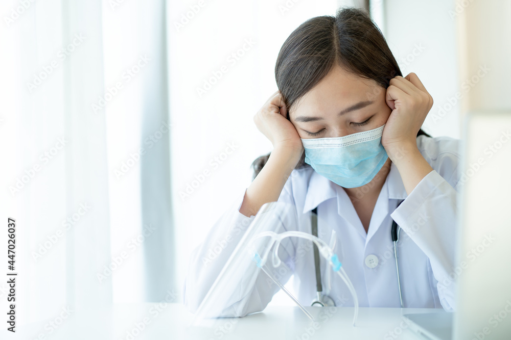 Hard working of Asian young female doctor in hospital, stressful. Hard working of Asian young female doctor in hospital, stressful.