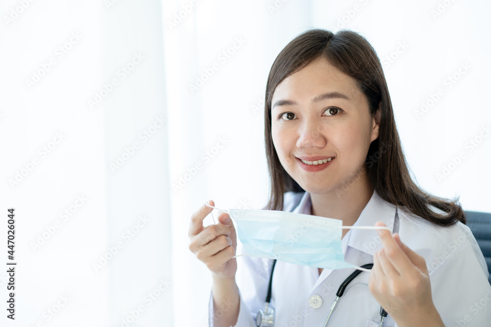 Asian female doctor using laptop computer for working in hospital. Asian female doctor using laptop computer for working in hospital.