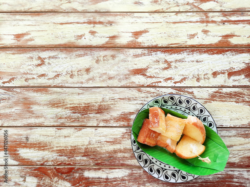 Thai toasts sprinkled with sweetened condensed milk and sugar.