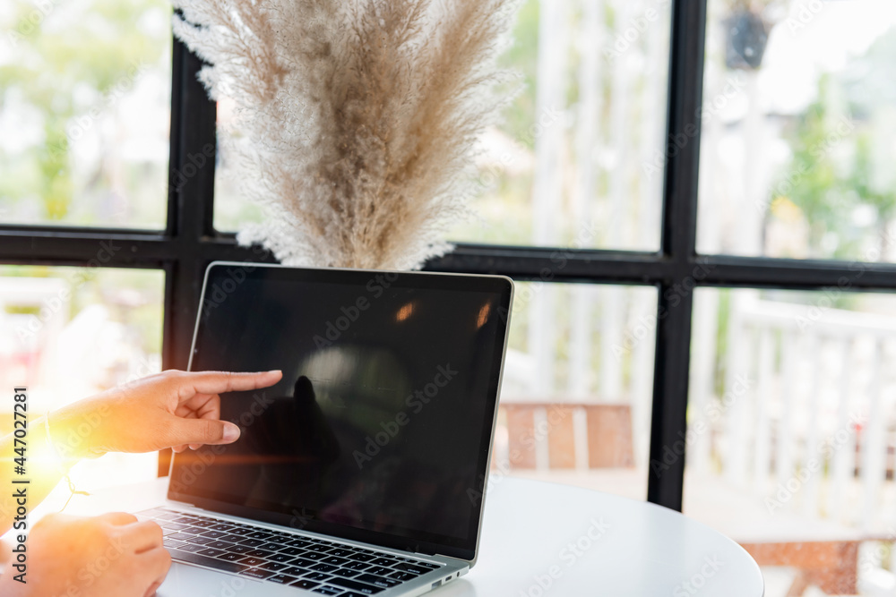 Modern computer.laptop with blank screen on wooden table with blur backgrounds. Modern computer.laptop with blank screen on wooden table with blur backgrounds.