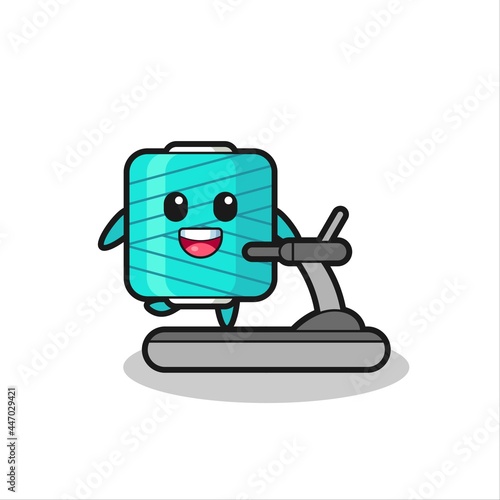 yarn spool cartoon character walking on the treadmill
