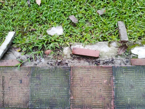 A View of footpath's corner damaged