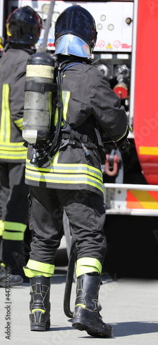 firefighter with oxygen cylinder of self-contained breathing apparatus During an emergency response