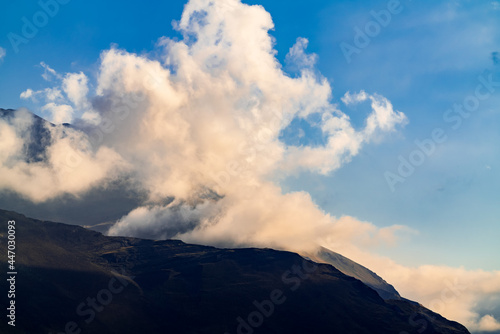 Thick clouds over the mountain peak