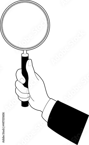 虫眼鏡を持つ手