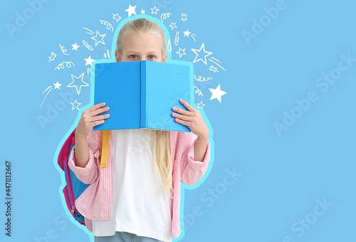 Cute little schoolgirl with...