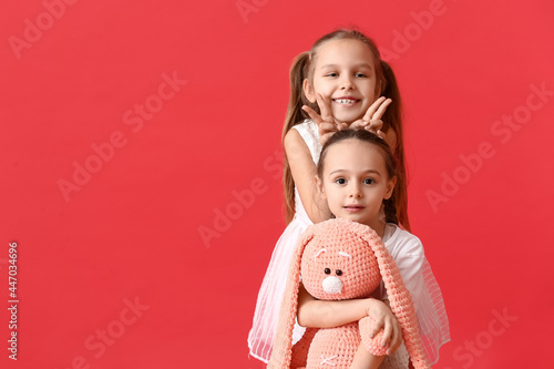 Cute little sisters with to...