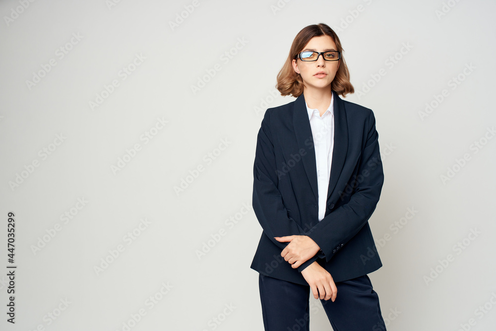 Business woman in black suit wearing glasses self confidence office Business woman in black suit wearing glasses self confidence office