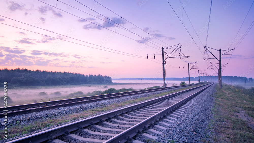 Fast traffic on rail flights. Towards sunset.