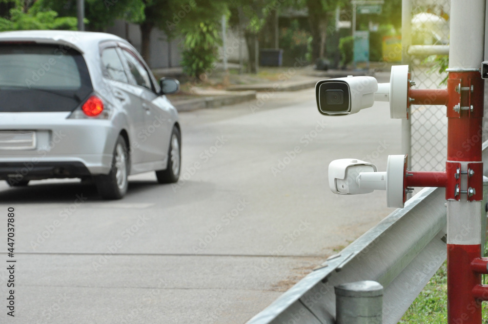 Fototapeta premium cctv camera beside the street in government office, concept public area surveillance.