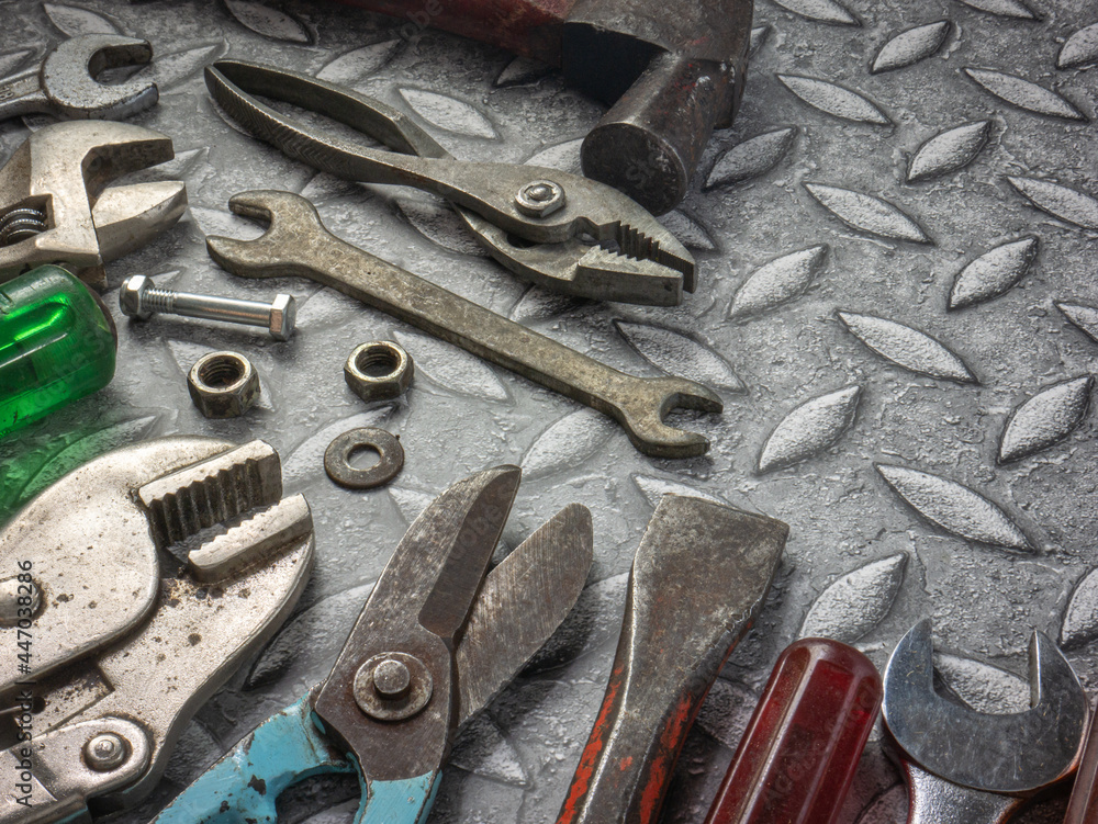 Fototapeta premium tools on Checker plate for safety or engineer concept.