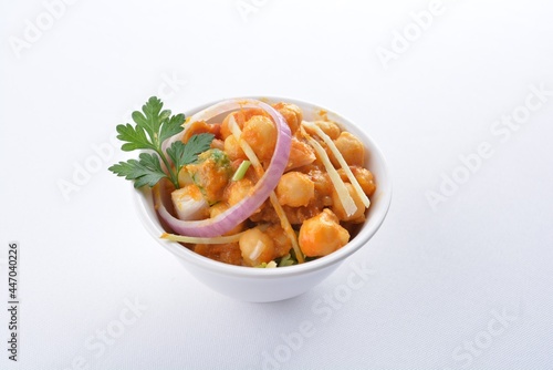 Indian vegetable bean curry in bowl in white background vegan dim sum Halal menu