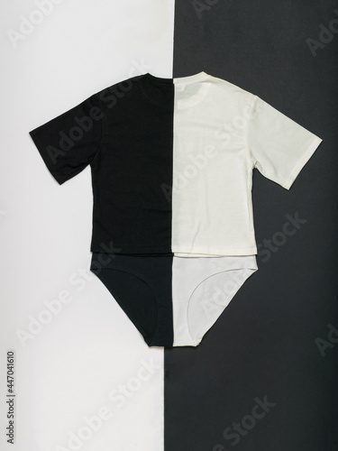 A set of underwear in black and white on a black and white background. Flat lay.