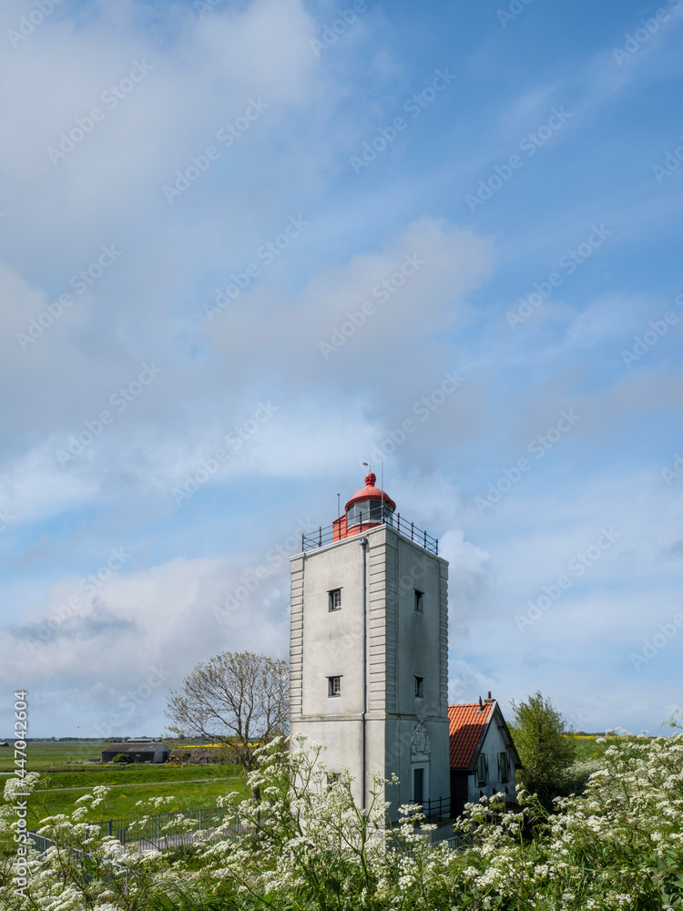 Lighthouse De Ven from 1700 on the IJsselmeerdijk between Andijk and Enkhuizen, Noord-Holland Province, The Netherlands