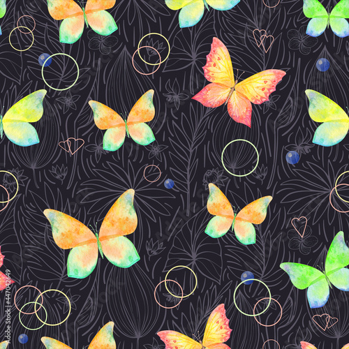 Seamless pattern of bgreen watercolor butterflies illustration on black background © tinkerfrost