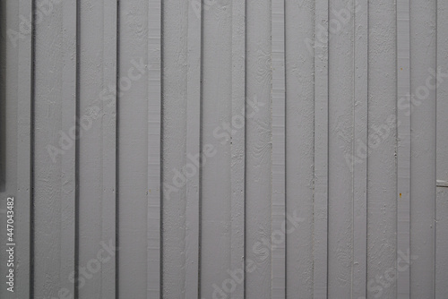 Gray wooden background with plank grey wood painted boards wallpaper
