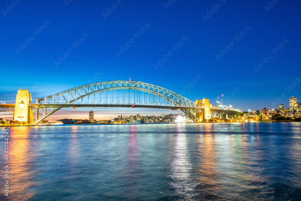 Sydney Harbour Bridge at night. It's a famous tourist attraction.