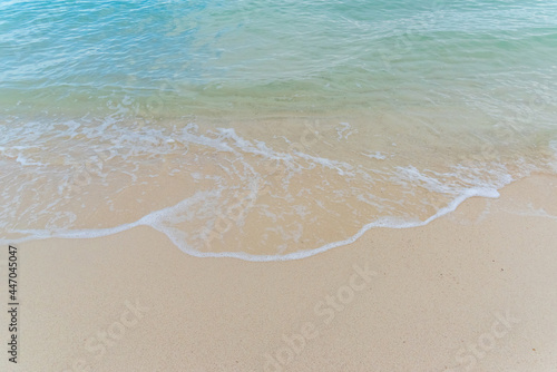 Nature in twilight period which including of sunrise over the sea and the nice beach. Summer beach with blue water and purple sky at the sunset.