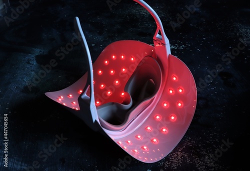 LED Light Therapy Facial Mask.  At home beauty facial rejuvenation. Red light