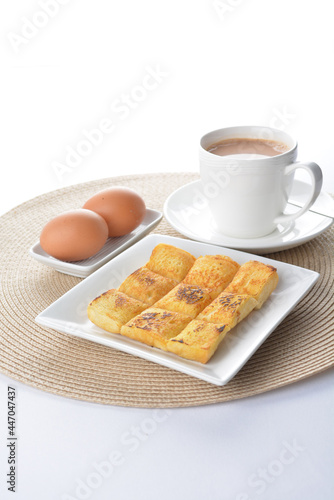 egg french toast bread set with half boiled egg and coffee or tea in white background asian halal menu