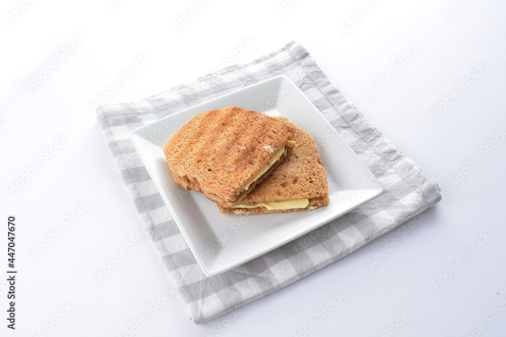 butter toast bread set with half boiled egg and coffee or tea in white background asian halal menu butter toast bread set with half boiled egg and coffee or tea in white background asian halal menu