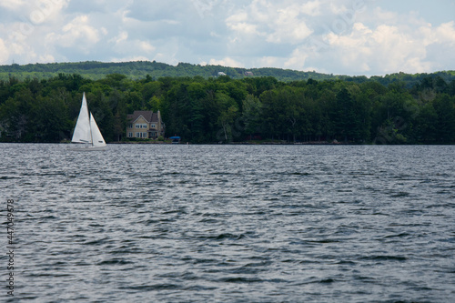 Sailing boat on a large canadian lake 