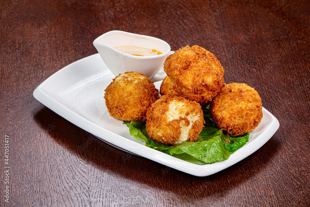 Fried cheese balls with sauce Fried cheese balls with sauce