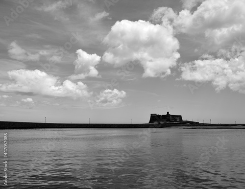 Coast of Arrecife city with the Castle of San Gabriel, black and white effect, Lanzarote Island, Spain