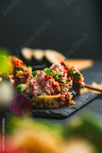 Sushi. Sushi with surimi. Decorated sushi with surimi, wasabi and ginger. 